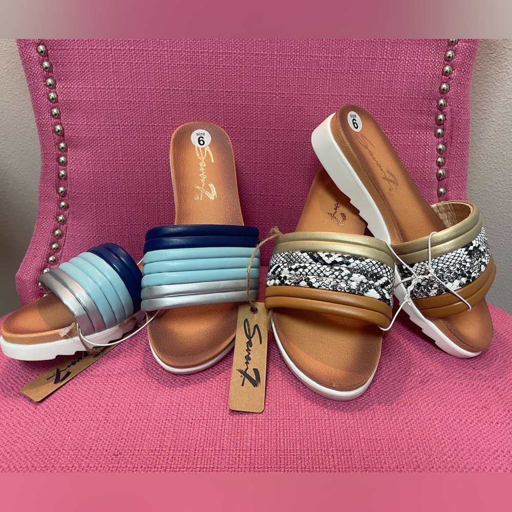 Seven NWT pearly comfort slides.  2 pair.
